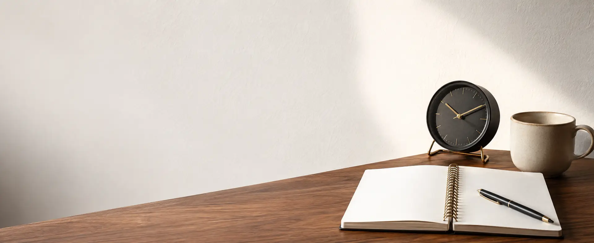 Active income vs passive income planning with a notebook clock and coffee